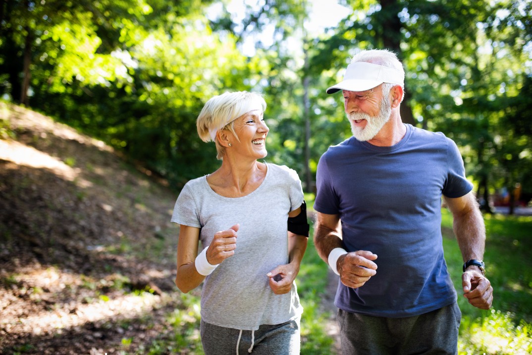 active seniors exercising outside, a great way to boost immune system