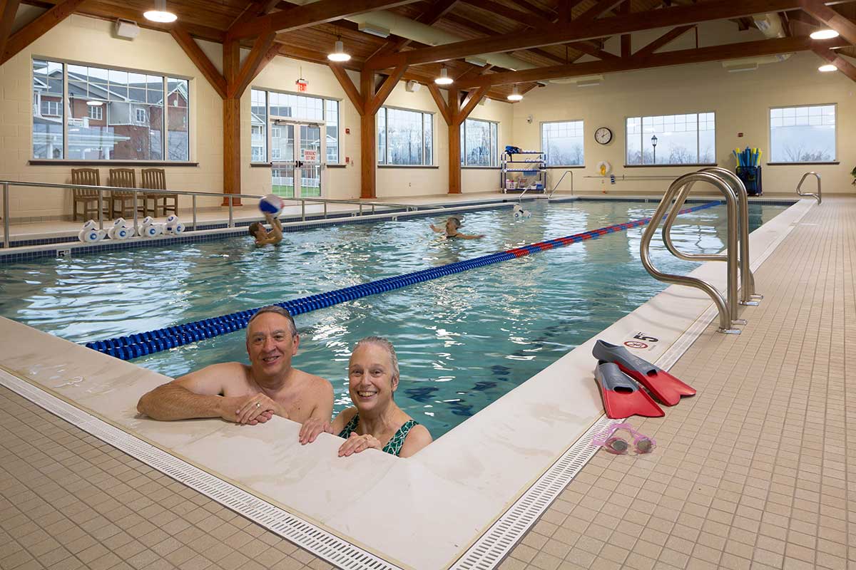 seniors enjoying the pool at The Glebe retirement community